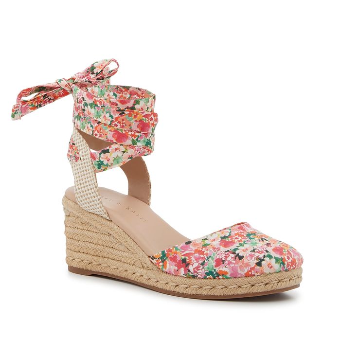 Kelly & Katie-Goldie Espadrille Wedge Sandal Elevate summery looks with the Goldie espadrille wedge sandal from Kelly & Katie. The espadrille wedge and textile design add that boho touch to finish off your fit with laidback vibes. Straw Sandals With Round Toe For Spring, Straw Wedge Sandals With Round Toe For Spring, Spring Espadrille Wedge Sandals With Woven Sole, Spring Straw Wedge Sandals With Round Toe, Spring Wedge Sandals With Woven Espadrille Sole, Spring Espadrille Wedge Sandals, Ankle Strap Sandals With Floral Print For Beach, Casual Wedge Sandals For Beach And Spring, Casual Wedge Sandals For Beach In Spring