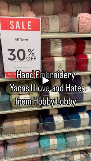 yarn is on display in a store with the sale sign for hand - embroidery yarns