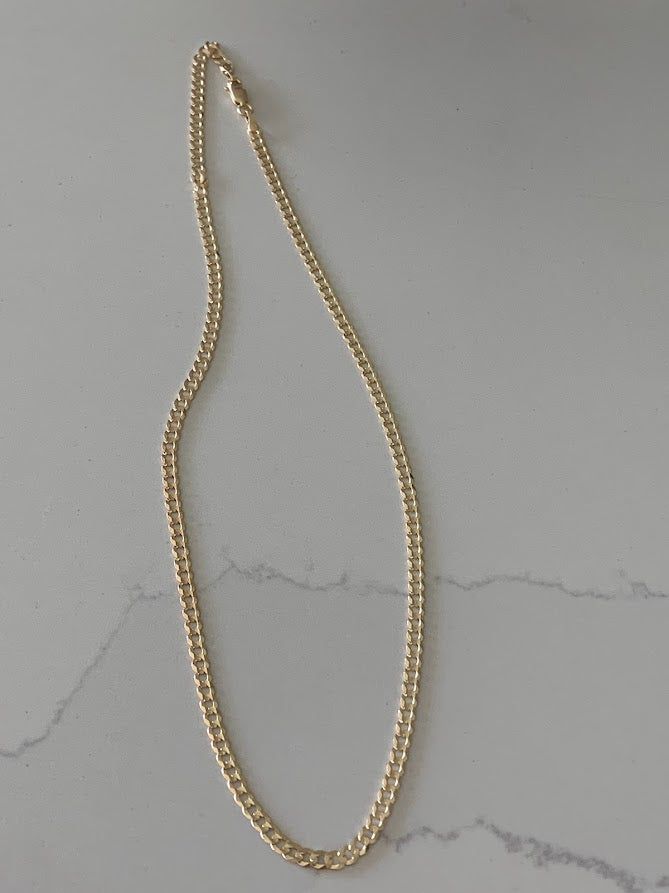 The 14K Gold 3.6 MM Cuban Concave Chain Link is the perfect piece of jewelry for everyday wear. Crafted with a solid 14K Yellow Gold Cuban Link, it measures 18", 20", 22" or 24" and is 3.6MM wide, making it an exquisite and fine addition to any wardrobe. ------------------------------------------------------------------------------------------------- 14K Gold Cuban Chain, 3.6MM Shiny, Cuban Link Necklace, Cuban Link , Genuine Gold Necklace, Solid Gold Cuban Chain Necklace------------------------ 14k Gold-filled Oval Link Necklaces, 14k Gold Charm Necklace With Chain, Gold 14k Charm Necklaces, 14k Gold Charm Necklaces With Chain, 14k Yellow Gold-filled Chain Necklace, Classic Round Chain Necklace For Everyday, Classic Rose Gold Necklace With Gold Chain, Everyday Rose Gold Necklace With Curb Chain, Everyday Rose Gold Curb Chain Necklace