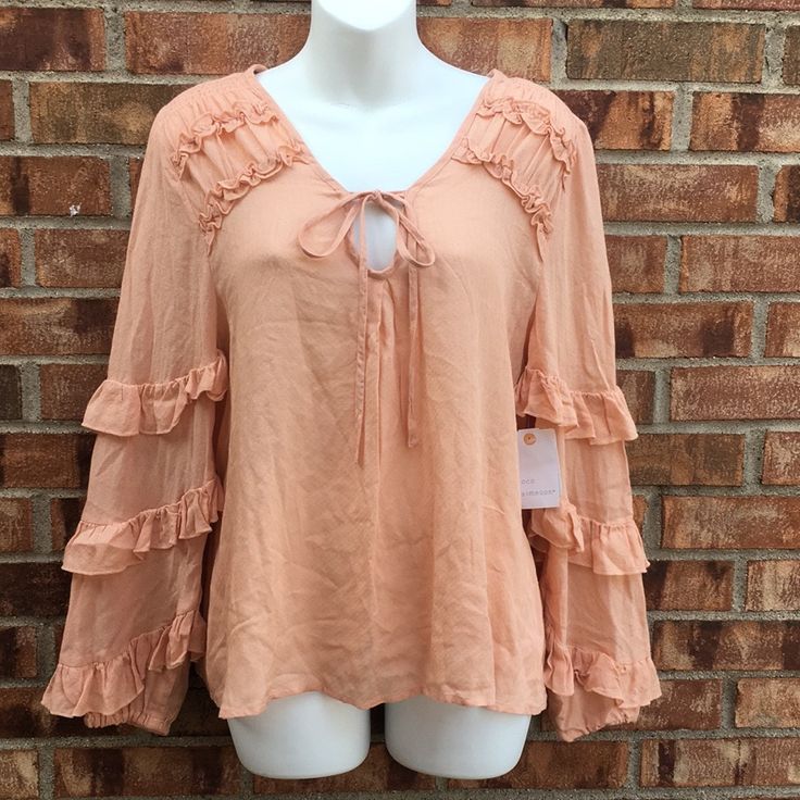 Gorgeous Ruffled Detail, Tie Neckline, Nwt Size Medium, Color Peach Spring Day Out Blouse With Ruffle Sleeves, Spring Ruffle Sleeve Blouse For Day Out, Trendy Spring Blouse With Ruffles, Ruffle Sleeve Blouse For Spring Day Out, Trendy Ruffled Blouse For Brunch, Spring Day Out Blouse With Ruffles, Spring Ruffle Blouse For Day Out, Spring Ruffled Blouse For Day Out, Bohemian Ruffle Tops For Brunch