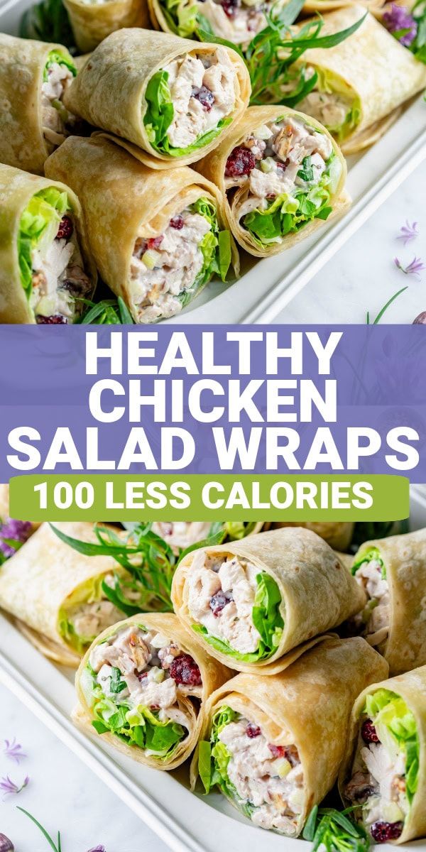 healthy chicken salad wraps on a platter with flowers in the background and text overlay that reads, healthy chicken salad wraps 100 less calories