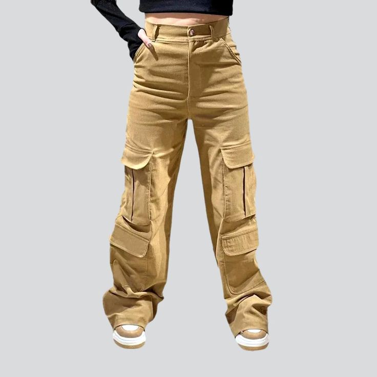 Introducing our sand hue women's cargo jeans from the 2023 Autumn-Winter Collection a traditional statement of vogue fashion!Why You'll Fall In LovePatterned to make a lasting impression. this cargo jeans is a perfect blend of Y2K trends and couture chic. From its sand hue and loose shape to its high rise and zipper & button closure. every detail promises to make you stand out in any crowd.Unmissable Highlights: Y2K Inspired: Bring back the nostalgia of the millennium with this cargo jeans. a sy Highlights Y2k, Y2k Trends, Silhouette Free, 2023 Autumn, Women Cargos, Vogue Fashion, Sand Color, Cargo Jeans, Bring Back