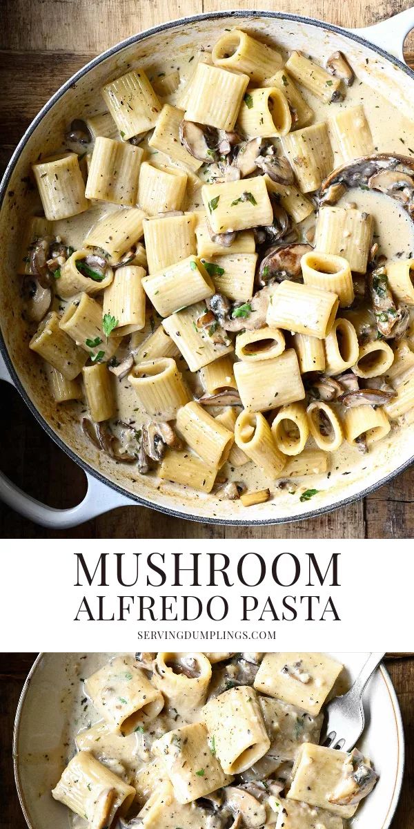 mushroom alfredo pasta in a skillet on a wooden table