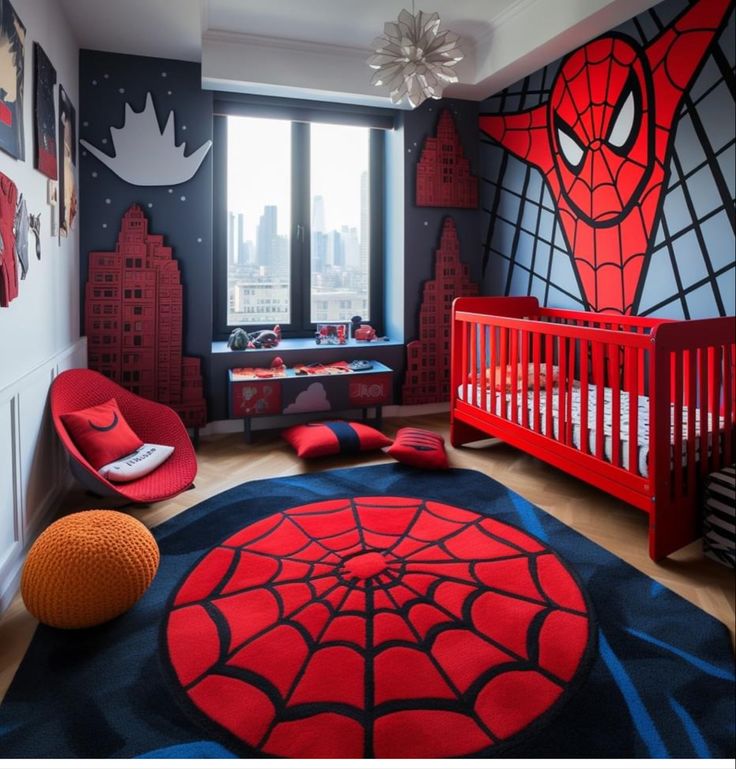 a bedroom with a spider - man theme on the wall and red crib bedding