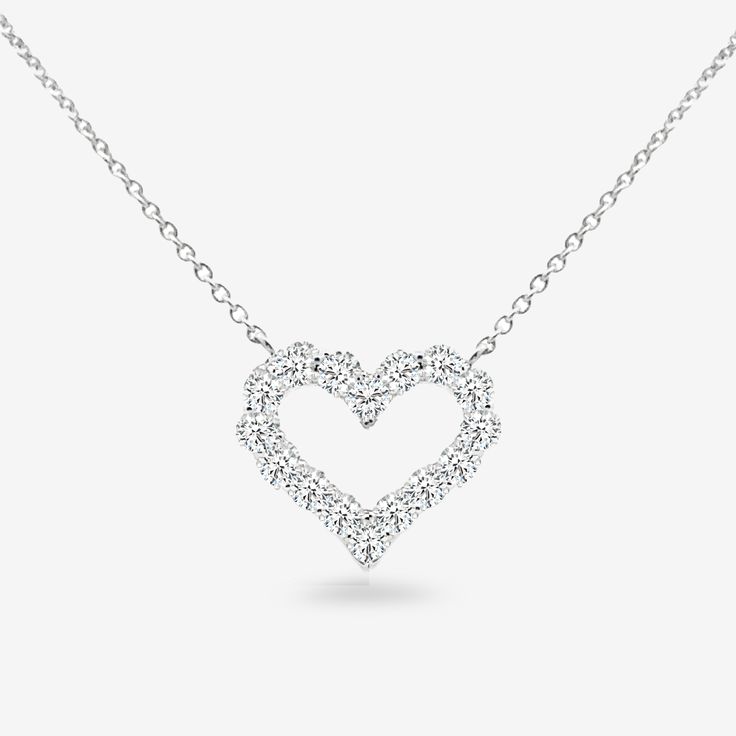 Our Diamond heart necklace, featuring an open design, combines romance and tradition. This pendant is the perfect way to express your heartfelt affection. Curate an eye-catching statement look by matching this with the other natural beauties from our Diamond Jewelry Collection. Natural Diamonds: 0.50ctw 14K Yellow or White Gold Length: 20 Inches Classic Diamond Necklace With Heart Charm For Wedding, Classic Wedding Diamond Necklace With Heart Charm, Classic Heart Necklace With Brilliant Cut Open Heart, Elegant Open Heart Diamond Necklace With Single Cut Diamonds, Classic Open Heart Diamond Necklace For Wedding, Elegant Open Heart Single Cut Diamond Necklace, White Open Heart Diamond Necklace For Wedding, Classic Diamond Heart Necklace For Wedding, White Diamond Open Heart Necklace For Wedding