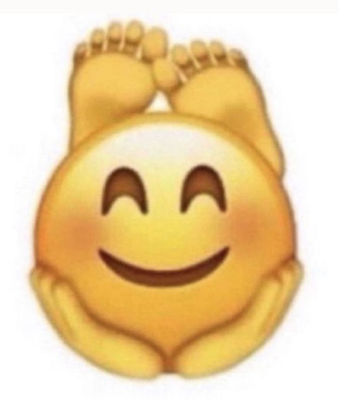 an emoticive smiley face with two hands on it's chest and eyes closed