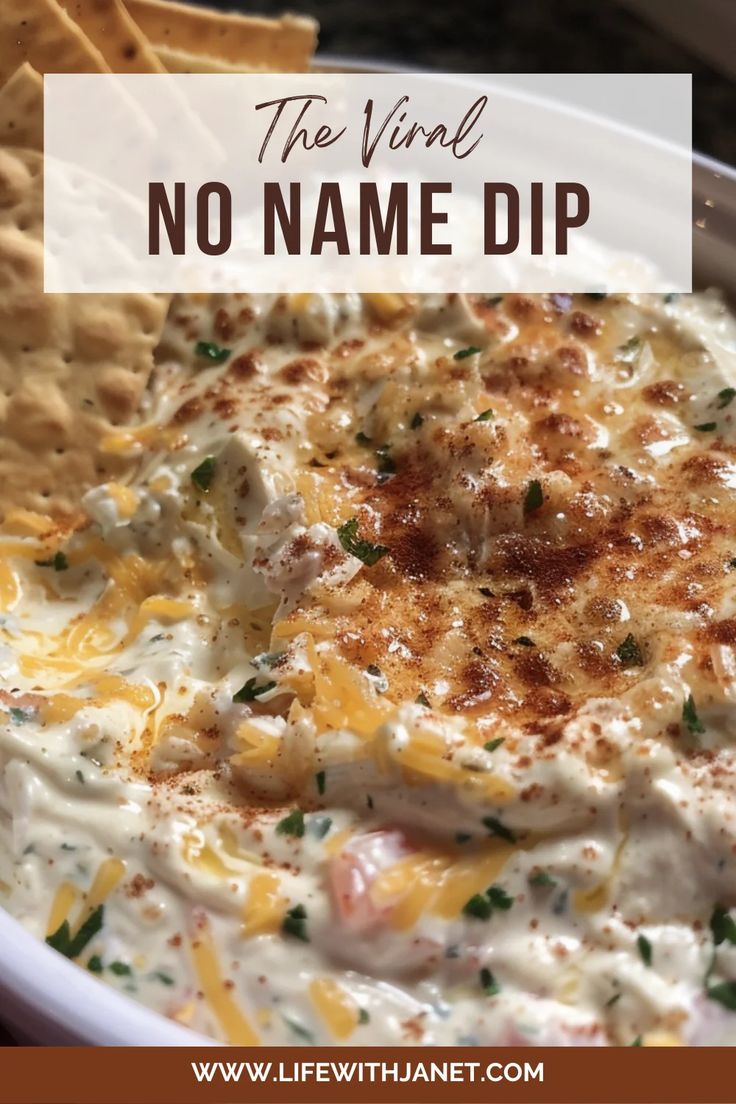 a close up of a bowl of dip with tortilla chips in the background