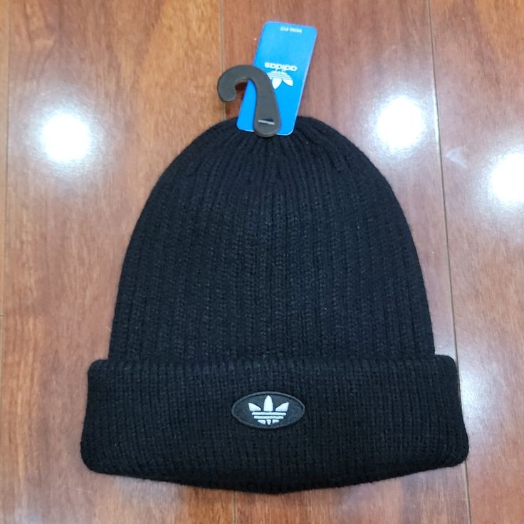 Nwt Unisex 100% Acrylic Black Ribbbed Knit Hat With Turnback Cuff Accented By White Adidas Logo. Style Is Mini Fit. Casual Black Knitted Hats, Solid Casual Beanie For Streetwear, Sporty Winter Beanie Hat, Casual Beanie For Winter Sports, Casual Knitted Beanie For Streetwear, Casual Solid Beanie For Streetwear, Sports Beanie For Winter, Winter Ribbed Beanie For Streetwear, Winter Streetwear Ribbed Beanie