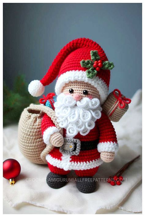 a crocheted santa clause is holding a sack and christmas tree ornament