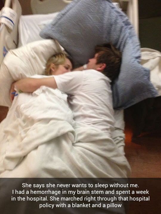 a man and woman laying in bed with the caption she says she never wants to sleep without me