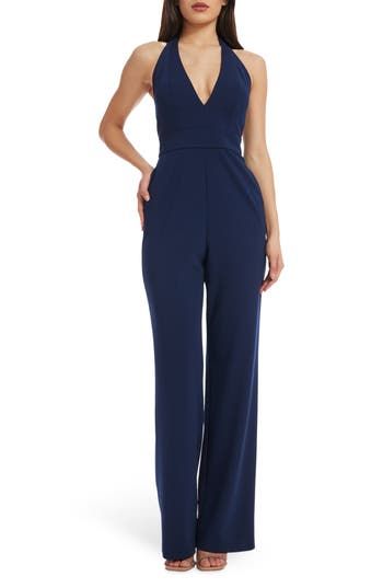 A plunging neckline draws attention to this stunning wide-leg jumpsuit with an open back and handy pockets. 48" length (size Small) Halter neck Adjustable tie straps 96% polyester, 4% spandex Machine wash, line dry Imported Elegant Strapless V-neck Jumpsuit For Night Out, Chic V-neck Jumpsuits And Rompers For Gala, Elegant Floor-length Strapless Jumpsuit For Formal Occasions, Elegant V-neck Jumpsuit For Date Night, Elegant Formal Floor-length Strapless Jumpsuit, Elegant Wide Leg Jumpsuits And Rompers For Formal Events, Elegant Wide Leg Jumpsuits And Rompers For Formal Occasions, Sleeveless Evening Jumpsuit With Tie Back, Chic Evening Jumpsuit With Tie Back