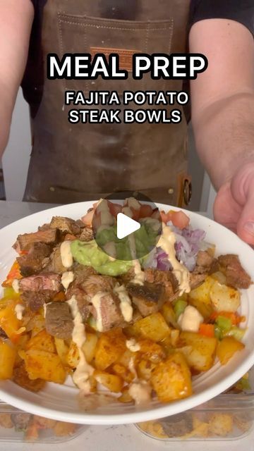 a person holding a plate of food with meat and vegetables on it in front of the words meal prep fajita potato steak bowls