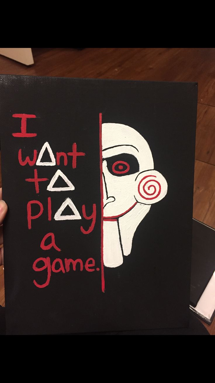 a person holding up a book with the words i want to play a game