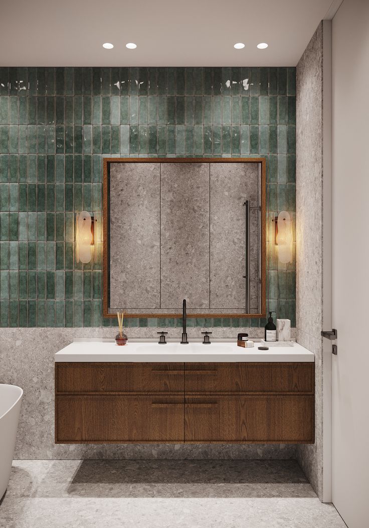 a bathroom with a sink, mirror and bathtub