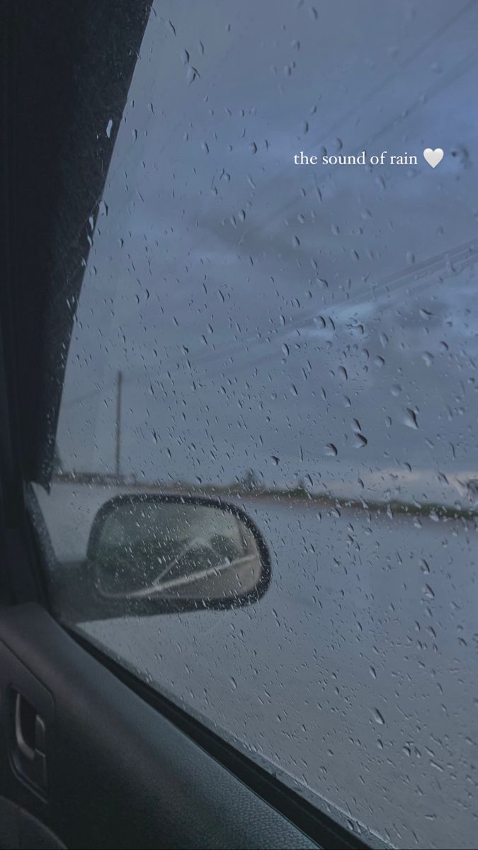 rain drops on the windshield of a car