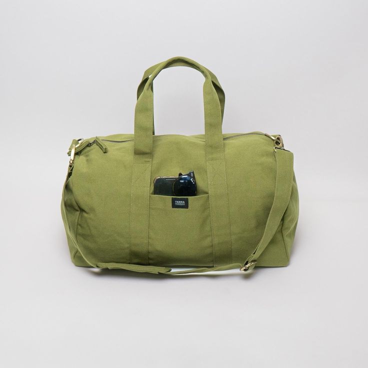 You won’t find a harder-working duffle than the Aarde Gym Bag for daily outings, outdoor activities, traveling and more! Durable and versatile, it’s the perfect size for a weekend trip or your daily workout. Your purchase also supports Feeding America's campaign to end hunger by helping giving meals to kids and families in need. Made with 14-oz Certified Fairtrade Organic cotton canvas Made in a Fair Trade Certified™ factory Approximately 32L capacity Main compartment zippers with long pulls Int Gym Bag Aesthetic, Number Gifts, Handmade Backpacks, Feeding America, Gym Bags, Bags Aesthetic, Weekend Trip, Weekend Trips, Daily Workout