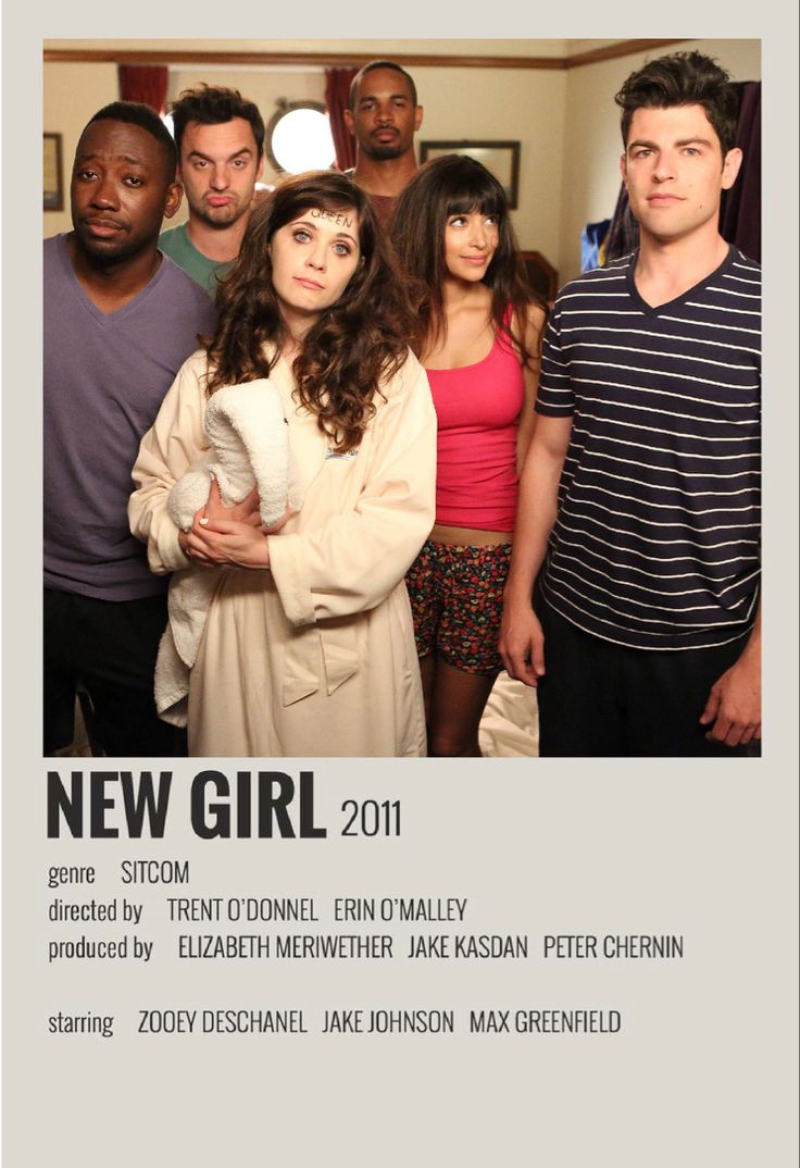 a group of people standing next to each other in front of a white poster with the words new girl on it