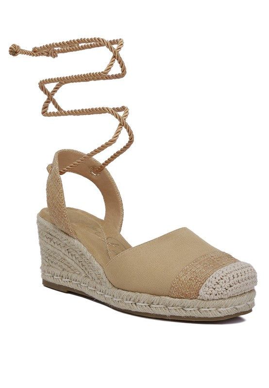 Introducing a classic go-to espadrille sandals with delicate lace-up details and a closed square toe. These OG beauties from London Rag boast a combination of micro suede and crochet, making them the perfect wedge-heeled companions for any aesthetic, be it summer vibes or autumn chic.Type: EspadrillesUpper Material: Micro Suede + CrochetLight Cushion InsolesOuter Sole: TPRLace-Up StrapsAnkle Strap DetailWedge HeelClosed Square ToeLight Cushion InsoleSH4560 Style: Casual Closure: Drawstring Made In: ChinaMaterial Composition: Micro Suede + Crochet Casual Lace-up Wedge Sandals With Woven Sole, Spring Lace-up Espadrille Wedge Sandals, Spring Lace-up Adjustable Wedge Sandals, Adjustable Lace-up Wedge Sandals For Spring, Casual Lace-up Wedge Sandals For Spring, Lace-up Wedge Sandals For Summer, Casual Adjustable Lace-up Sandals With Wedge Heel, Lace-up Espadrille Wedge Sandals For Summer, Chic Lace-up Wedge Heel Sandals For Spring