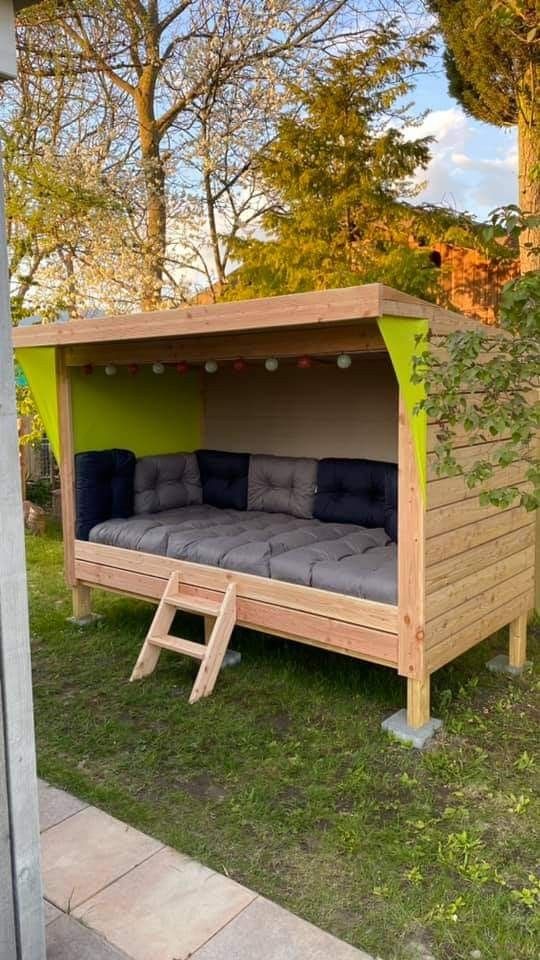 a bed in the shape of a shed