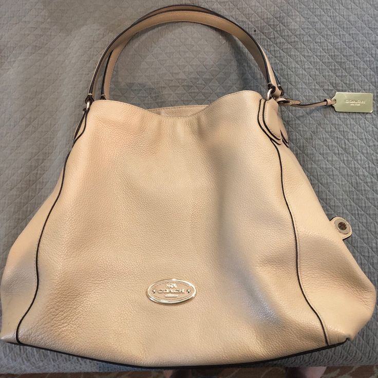 Barely Used Tan Leather Coach Bag. Made Up Of Three Large Pockets (One With Zipper) With Magnet Snap Closure Classic Cream Hobo Bag, Elegant Cream Hobo Bag For Travel, Classic Satchel With Silver-tone Hardware For Errands, Elegant Cream Hobo Bag, Formal Cream Hobo Bag With Removable Pouch, Elegant Hobo Bag With Removable Pouch For Errands, Elegant Hobo Bag With Silver-tone Hardware For Errands, Elegant Coach Hobo Bag For Travel, Elegant Cream Hobo Bag For Shopping