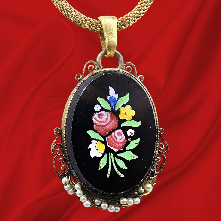 Art Deco Hand Painted Pendant, Antique Necklace, Floral Painted Necklace Great antique floral hand painted pendant on a gold filled mesh chain. Black onyx with floral design. The pendant is 1 1/2" long x 1 1/8" wide. The original chain is 16" A twisted seed pearl design at the bottom of the pendant   makes this a unique piece . Painted Necklace, Hand Painted Pendant, Antique Floral, Pearl Design, Antique Necklace, Seed Pearl, Necklace Gift, Black Onyx, Locket