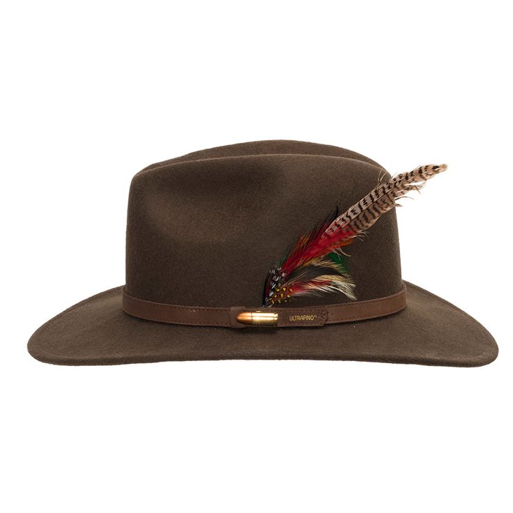 The Freedom Western Cowboy hat is a crushable genuine Australian wool felt fedora with a tall blocked center dent crown. This hat features an authentic leather hatband, a wide brim, two cowboy pins on each side, real exotic feathers, and a breathable sweatband. The brim contains a wire to hold its shape. Prepare yourself to stand out from the rest with this design. The Freedom is perfect for any occasion since its design is classic, very flexible, and will improve any outfit. Featuring unique de Western Style Brown Fur Felt Hat Bands, Western Brown Fur Felt Hat Bands, Leather Fedora For Western-themed Events, Western Brown Fur Felt Hat, Brown Western Felt Hat For Hunting, Brown Fur Felt Hat Bands For Western-themed Events, Western Style Hunting Fedora, Western Brown Fedora For Hunting, Western Style Short Brim Hunting Hat