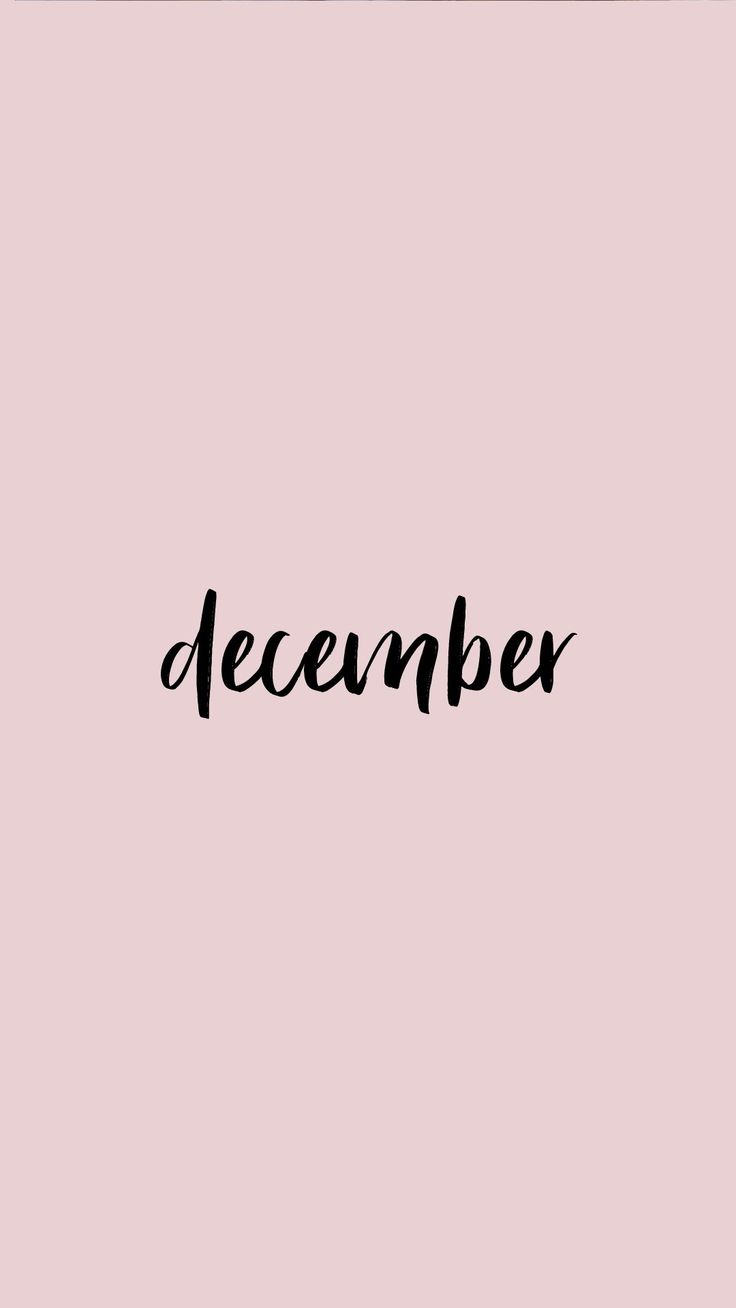 the word december written in black ink on a pink background