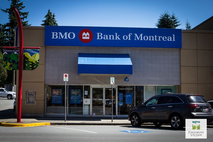 an empty parking lot in front of a bank