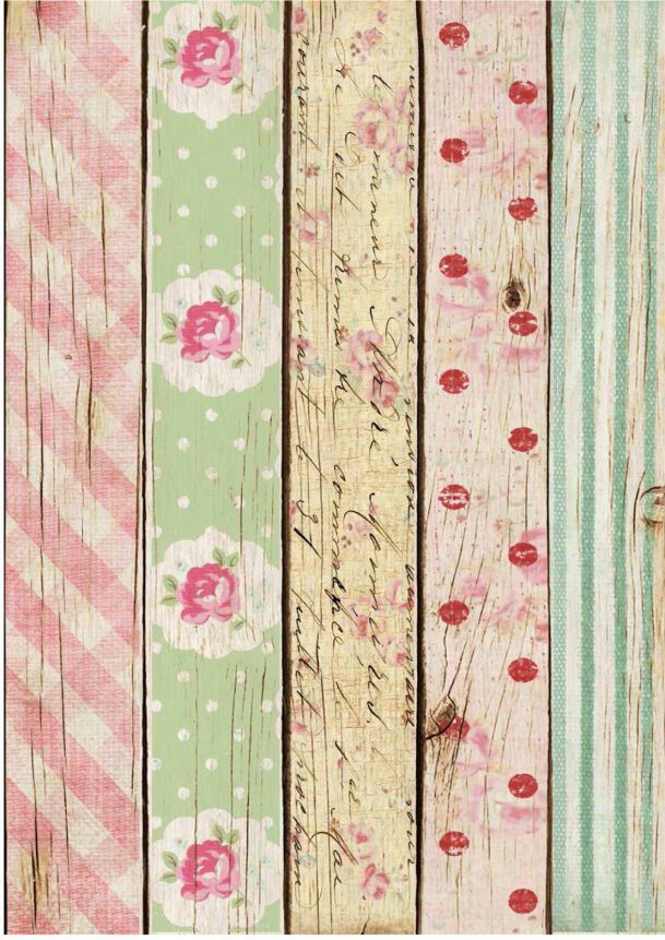 an old wooden wall with flowers painted on the wood planks in pink, green and white