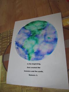 a card with an image of the earth in blue and green on it that says, in our beginning god created the heaven knows and the earth