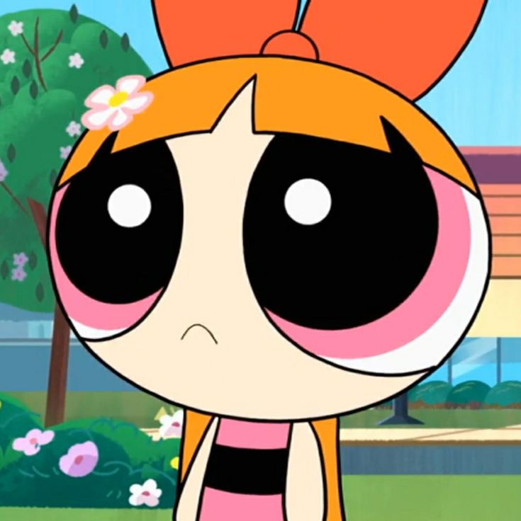 the powerpuff girl is standing in front of some flowers