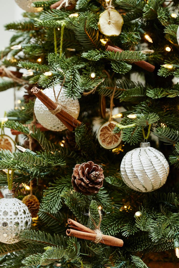 a christmas tree with ornaments hanging from it