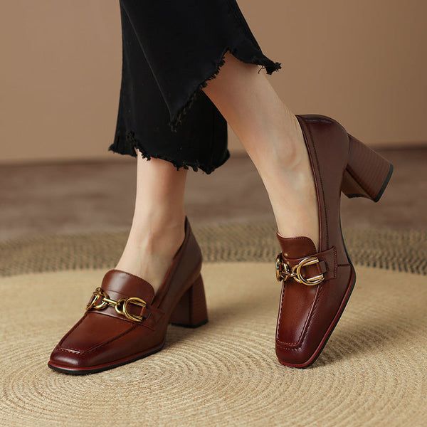 Step into style with our women's loafers with heels. These shoes are perfect for work or play. and they'll keep you looking sharp all day long. The cognac-colored leather is rich and luxurious. and the square toe gives them a classic look. The gold metal detailing adds a touch of sophistication. and the low heel makes them comfortable to wear all day long. Whether you're headed to the office or out on the town. these loafers will have you looking your best. Upper: Lambskin Lining: Leather Outsol Luxury Square Toe Loafers For Business, Luxury Traditional Closed Toe Loafers, Luxury Classic Dress Shoes With Square Toe, Luxury Slip-on Square Toe Leather Shoes, Chic Loafers With Block Heel For Work, Chic Block Heel Loafers For Business, Chic Block Heel Loafers For Workwear, Chic Business Loafers With Block Heel, Elegant Slip-on Platform Loafers For Office