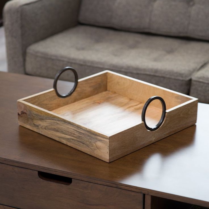 a wooden tray sitting on top of a table