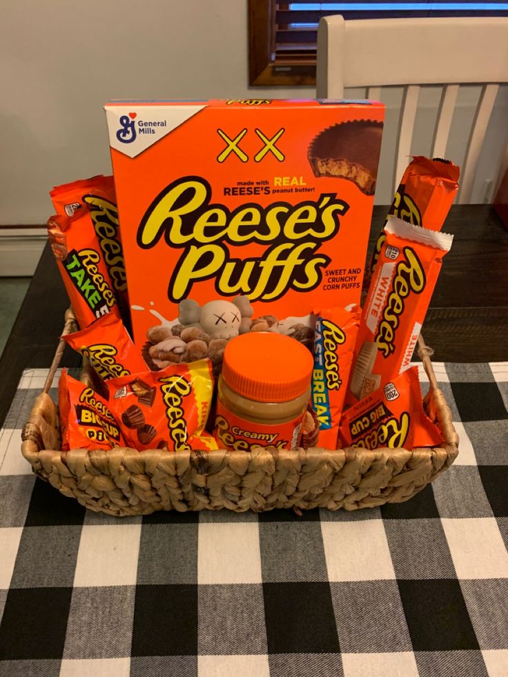 a basket filled with snacks sitting on top of a table