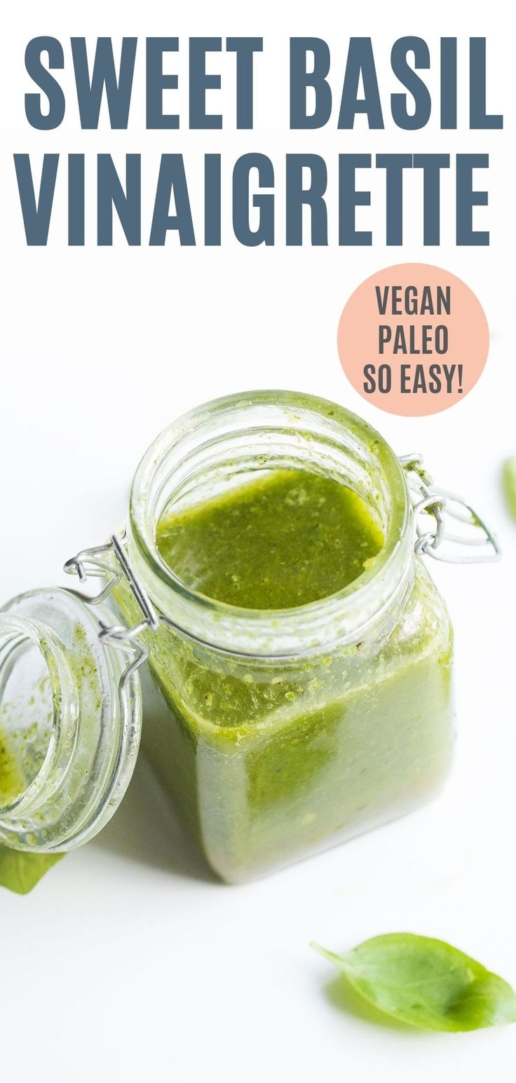 a jar filled with pesto sauce next to some green leafy vegetables and the words sweet basil vinaigrette