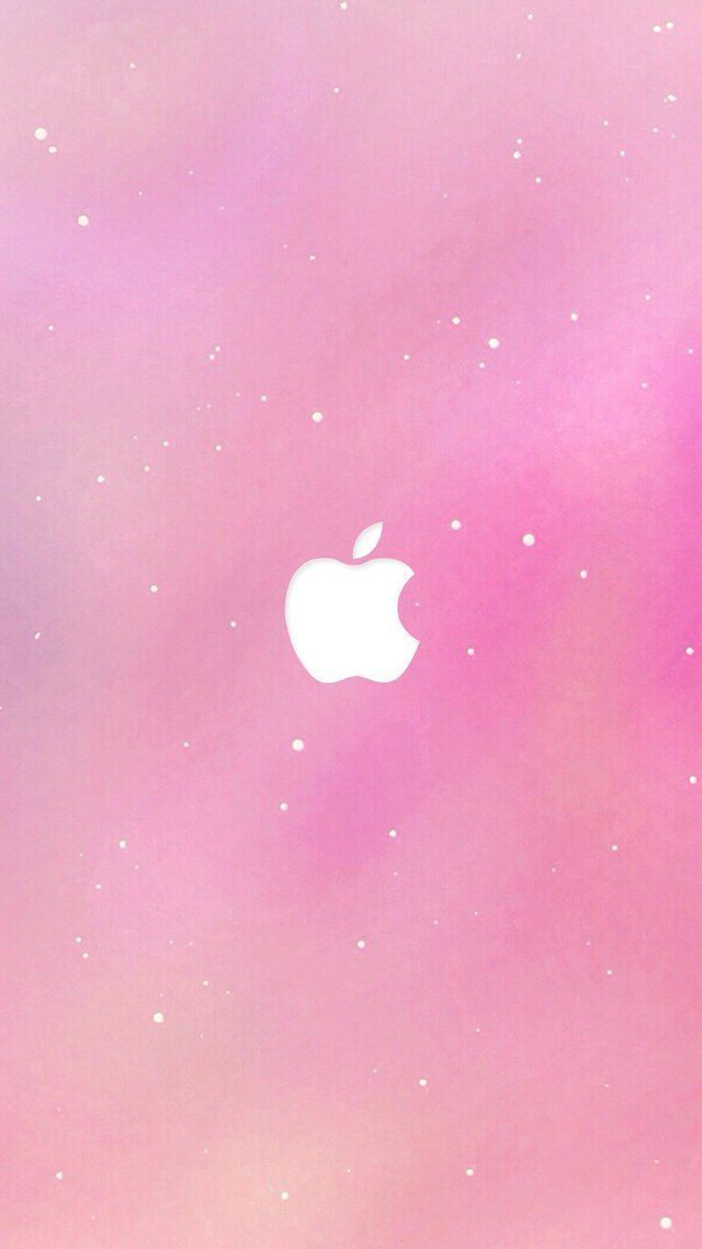 an apple logo on a pink and purple background with stars in the sky above it