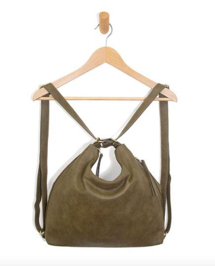 So soft and slouchy in buttery soft vegan leather this convertible bag is accented with our signature logo zip pull and is the ultimate in versatility. It can easily be carried two ways, as a slouchy cool hobo or simply cinch the straps and you can carry as a backpack. So easy to change up your look but looks perfect either way. This gorgeous, versatile bag is destined to become your new go to! Product Details 13.5” high, 14” wide, 3.25” deep Convertible shoulder straps drop length: 11” Hobo con Versatile Everyday Convertible Shoulder Bag, Versatile Hobo Bag With Adjustable Strap, Versatile Hobo Bag With Zipper Closure, Chic Convertible Shoulder Bag For Everyday, Versatile Green Hobo Bag With Zipper Closure, Trendy Softback Hobo Bag With Adjustable Strap, Versatile Green Leather Backpack, Versatile Soft Leather Backpack, Versatile Hobo Bag