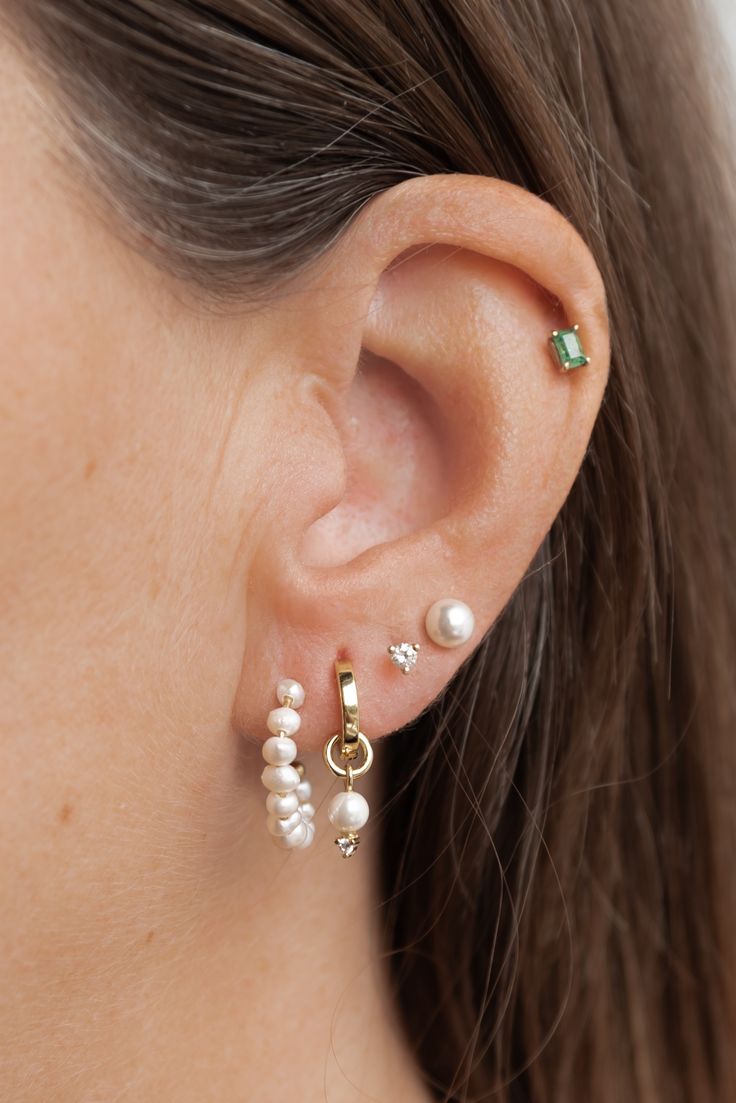 Create this ear stack with our new Harper Pearl Half Hoops and Pearl Diamond Hoop Charm. Bridal Stacked Earrings, Silver Earring Combinations, Wedding Ear Piercings, Bridal Earrings Multiple Piercings, Wedding Earrings Multiple Piercings, Bridal Earring Stack, Wedding Earring Stack, Pearl Earring Stack, Silver Earring Stack