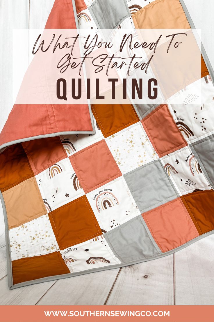 an orange and white quilt with the words what you need to get started quilting