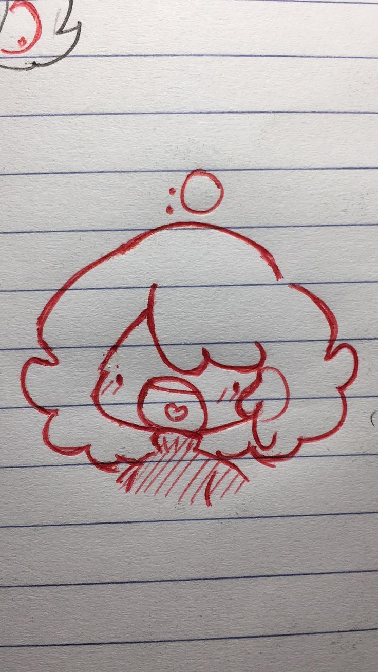 a drawing of a girl with curly hair and bubbles on her face is drawn in red pencil