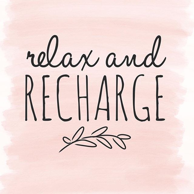 the words relax and recharge written in black ink on a pink watercolor background