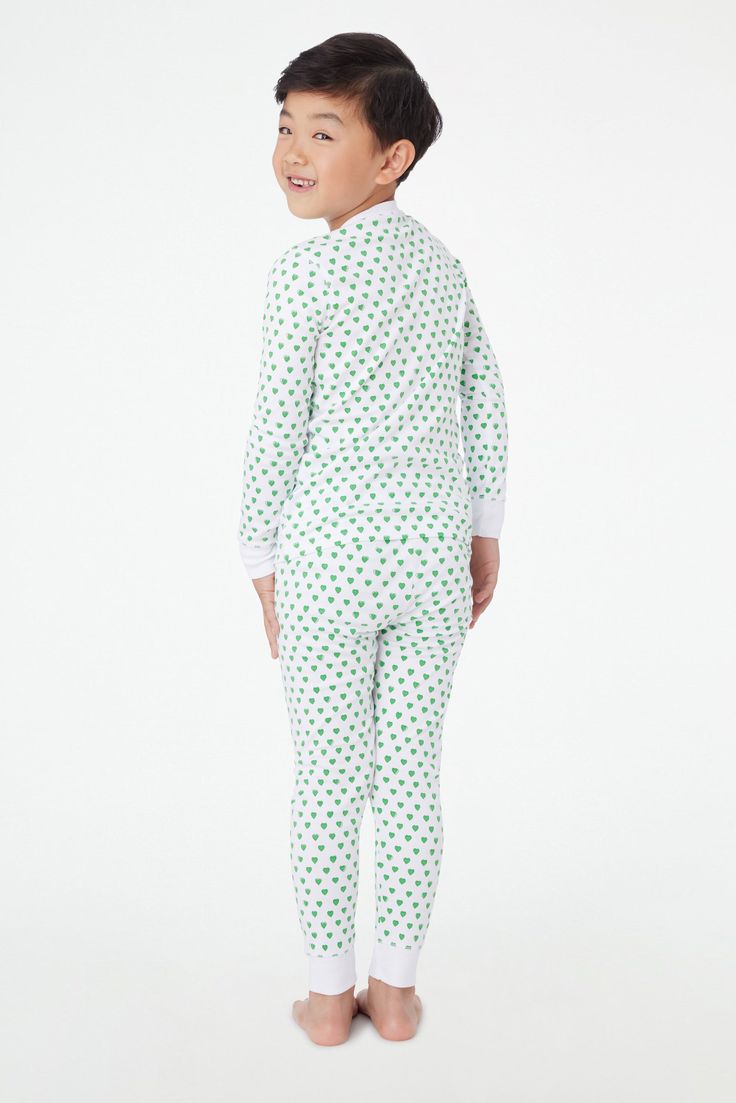 We're all looking forward to bedtime stories in these adorable Hearts Pajamas! With oh-so-comfy 100% premium cotton, this matching top and bottom set is perfect for slumber parties. And a match your mini moment?! Doesn't get sweeter than that! 3 Button Henley Elastic Waist Super-Smooth Flatlock Seams Runs Small; Please Size Up Materials and Care 100% Long-Staple Premium Cotton Cold Wash, with like colors. Do not bleach Tumble dry low (Line dry recommended). Warm iron if needed Imported Prewashed Playful Cotton Sleepwear For Pajama Party, Cozy Cotton Bedtime Sets, Cotton Pajama Party Sets For Winter, Cotton Pajama Sets For Winter Pajama Party, Cotton Pajama Sets For Winter Party, Cotton Sets For Pajama Party In Winter, Cotton Sleepwear Matching Set For Sleepover, Playful White Loungewear Sets, Playful White Lounge Set