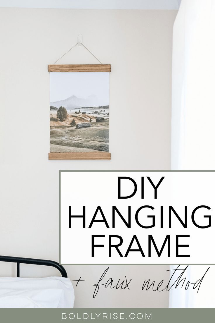 a frame hanging on the wall with text overlay that reads diy hanging frame