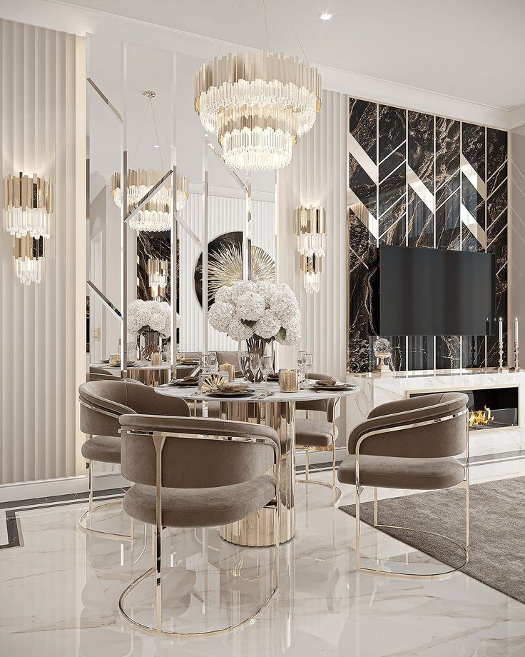 an elegant dining room with chandeliers and marble flooring is featured in this image