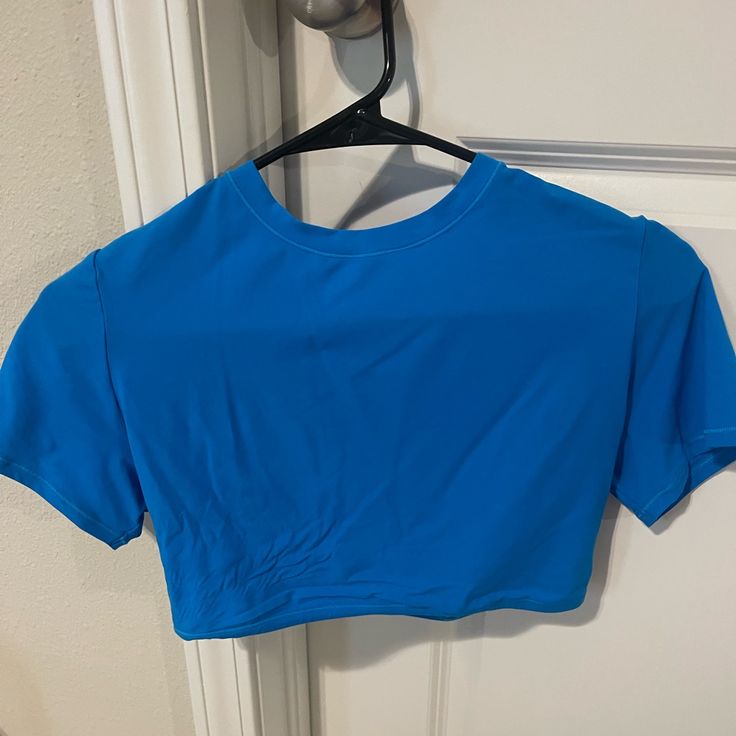 The Purple Is Nwt, Blue Is Nwot Blue Fitted Basic Tops, Fitted Blue Basic Tops, Purple Stretch Crop Top With Short Sleeves, Purple Cotton Workout Top, Light Blue Short Sleeve Sports Top, Blue Basic Tops With Moisture-wicking, Blue Stretch Basic Activewear, Light Blue Short Sleeve Tops For Sports, Basic Blue Stretch Activewear