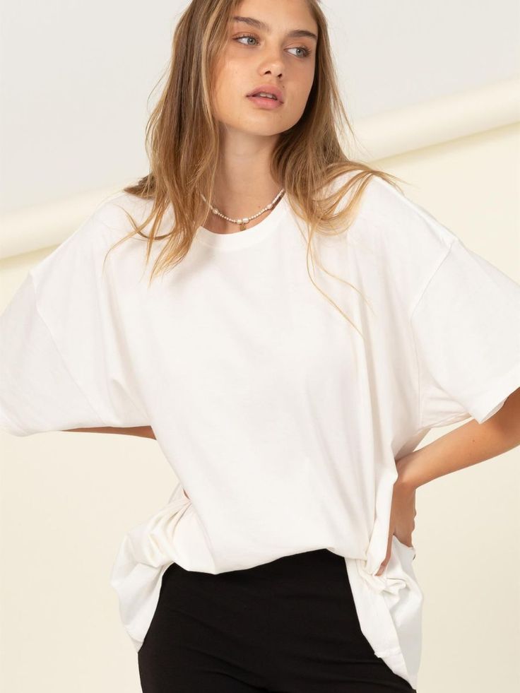 Have a more leisurely day in this Just Chilling Oversized T-Shirt. A casual tee that shapes a crew neckline with drop shoulders and short sleeves over a wide-cut bodice that extends into an oversized silhouette with a simple hem. Choose your favorite color and pair it with cute shorts and or your favorite denim or knot it over a midi skirt. Colors: Whipped Cream, Black, Jam, Brown Sugar, Hunter Green, Blush, or Dusty Blue Fabric: 100% Cotton Includes: x1 Shirt Sizes: S/M or M/L Dusty Blue Fabric, Whip Cream, Just Chilling, Oversized Silhouette, Cute Shorts, Oversized T Shirt, Oversized Tee, Casual Tee, Hunter Green