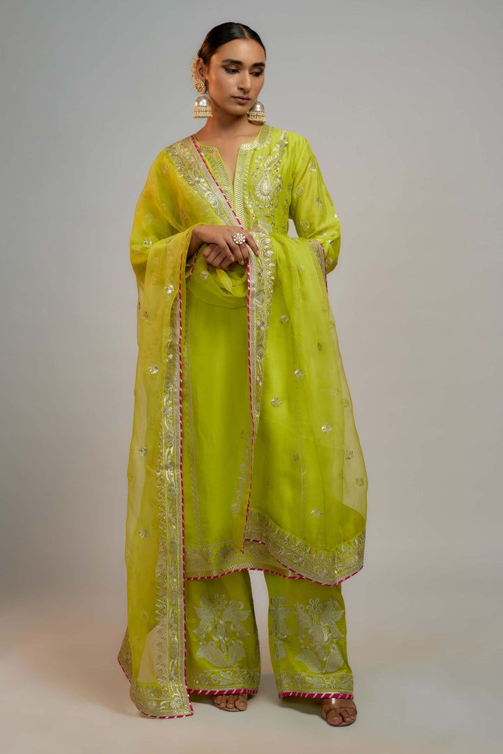 Gopi Vaid | Yellow One Shoulder Top And Pants | INDIASPOPUP.COM Elegant Green Palazzo Set With Gota Work, Elegant Pista Green Sets With Gota Work, Bollywood Style Pant Set With Sheer Dupatta For Festivals, Festive Pant Set With Sheer Dupatta For Festivals, Festive Chanderi Straight Palazzo Set, Festive Palazzo Set With Dupatta And Straight Pants, Elegant Straight Kurta Pant Set With Gota Work, Summer Pant Set With Sheer Dupatta, Traditional Drape Summer Festive Pants