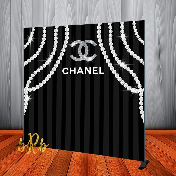 a chanel backdrop with pearls and diamonds