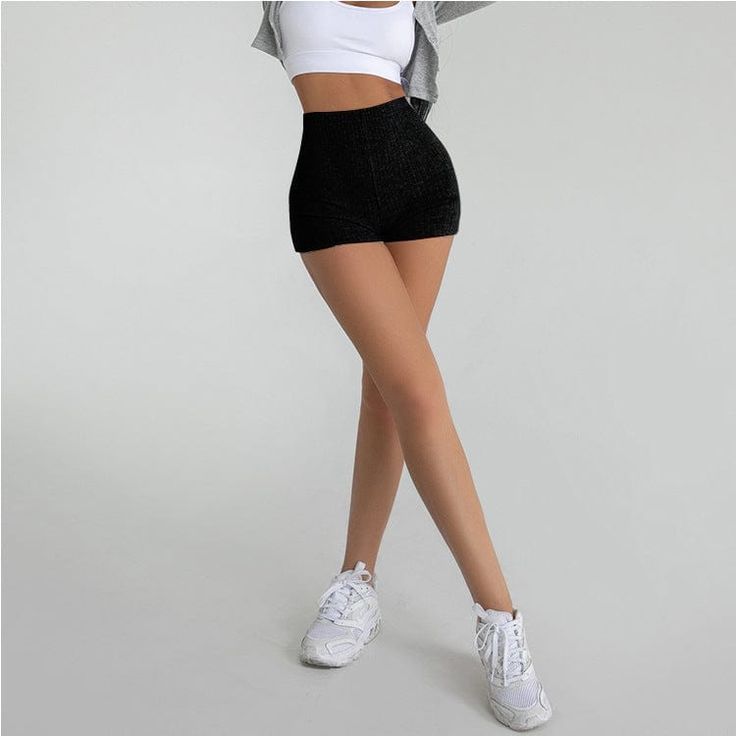 The Emes Shop shorts is detailed with a high waisted fit and a ribbed surface. Features a soft and stretchy material and can be worn for either workouts or a casual athleisure wear. MATERIAL: 80% Nylon. 20% Cotton BlendMEASUREMENTS: X-Small Waist: 21.33"- 22.8 in Hips: 28.3" in Length: 12.2" in Small Waist: 22.8" - 24" in Hips: 29.9" in Length: 12.6" in Medium Waist: 24"-25.5" in Hips: 31" in Length: 13" in Sporty High Waist Bottoms With Built-in Shorts, High Waist Compression Shorts For Sportswear, High Waist Compression Sportswear Shorts, High Waist Compression Gym Shorts, High Stretch High Waist Sportswear Shorts, High Stretch High Waist Sporty Shorts, Stretch High-waisted Athleisure Shorts, Trendy High Stretch High-waisted Shorts, Stretch High Waist Sportswear Shorts